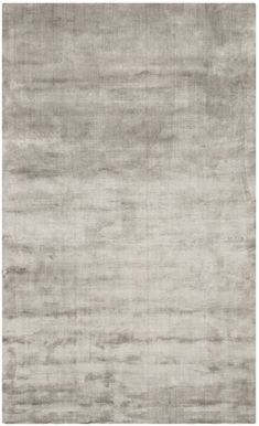 an area rug with grey tones