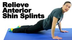 a man is doing an exercise on a blue mat with the words believe, interior shin splints