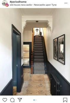 the hallway is clean and ready to be used as an entrance way for someone's home