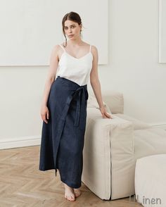 Check out our Linen Wrap Skirt! It's all about easy style and comfort. Made from top-notch linen, this skirt is perfect for all-day wear. Plus, its wrap design lets you adjust the fit just how you like it. MATERIAL: - High quality natural linen 100%  Listing INCLUDES: - 1 pc. Wrap Skirt  FEATURES: - Wide bottom - Waist tie - 100% Linen - Stonewashed - Soft - OEKO TEX Certified Model is wearing size M Color: Midnight Blue Model Measurements: Height: 5.7 ft. (176 cm) Bust: 35.4' (90 cm) Waist: 24. Bas Large, Linen Wrap Skirt, Linen Top Women, Linen Men, Easy Style, Mens Linen, Natural Linen, Wrap Skirt, Beige Color