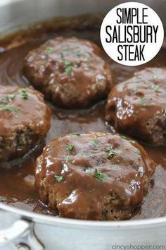 some meatballs are being cooked in a pot on the stove with a label that says simple salisbury steak