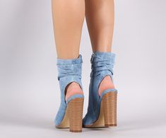 These chic booties features a slouchy shaft with cutout design back and squared open toe silhouette. Finished on a chunky stacked heel and side zipper closure. Material: Denim (man-made) Sole: Synthetic Measurement Heel Height: 4.5″ (approx) Shaft Length: 9″ (including heel) Top Opening Circumference: 10″ (approx.) Heeled Boots With Stacked Block Heel For Spring, Spring Heeled Boots With Stacked Block Heel, Spring Heeled Boots With Stacked Heel, Chic Spring Booties With Square Toe, Spring Chic Square Toe Booties, Spring Fitted Booties With Block Heel, Chic Spring Booties With Stacked Heel, Trendy Heeled Boots With Stacked Heel For Spring, Casual Heeled Boots With Stacked Heel For Spring