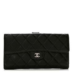 This is an authentic CHANEL Lambskin Quilted Large Flap Wallet in Black. This chic wallet is crafted of diamond quilted lambskin leather in black. It featuresa front flap with a small polished silver Chanel CC logo. Thisopens with a snap to a burgundy leather interior with card slots, patch pockets, flap pocket, and bill compartment. Chanel Small Flap Wallet, Diamond Quilt, Cc Logo, Leather Interior, Lambskin Leather, Flap Pocket, Patch Pocket, Card Slots, Slots