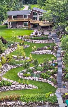 an aerial view of a house and its landscaping