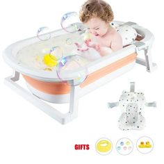 a baby in a bath tub with soap bubbles floating around it's head and body