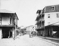 an old black and white photo of some buildings