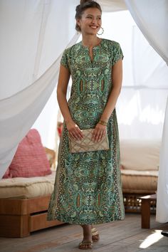 "The amazing Leyla dress in a new color for Summer 2022 - Green and Gold Sparkly Ethnic Paisley print, great for Day or Evening, a Kaftan Dress for special occasions for vacation and holidays and for any time! it has an Oversize fit, sizes XS to XXL - a Women Summer Maxi Dress, it will surely gather so many compliments! This kaftan dress is inspired by Moroccan Kaftan - Galabeya. Elegant gold ornament allover design, oversized for free movement and comfort and can be transformed for any occasion Women Maxi Dresses Summer, Evening Maxi Dress, Gold Ornament, Gold Paisley, Moroccan Kaftan, Allover Design, Oversized Shirt Dress, Free Movement, Oversize Women