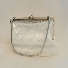 "Here's the brides \"something old\" that still looks brand new!  Its the perfect vintage bridal bag.  Delicate white beading with gold chain and accents and a creamy ivory lining.  5.5\"x4\" bag, base is 6\"x2.5\"" Classic White Bridal Accessories For Formal Occasion, Classic Clutch Evening Bag For Wedding, Vintage White Clutch For Events, Vintage White Bags With Pearl Handle, Vintage White Bag With Pearl Handle, Classic White Wedding Bag, Vintage Formal Clutch With Pearl Handle, Formal Vintage Evening Bag With Pearl Handle, Formal White Bags With Pearl Details