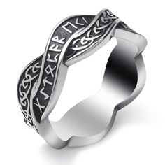 a silver ring with an inscription on the side and two intertwineds in it