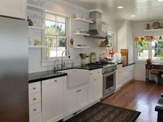 the kitchen is clean and ready for us to use in its new owner's home