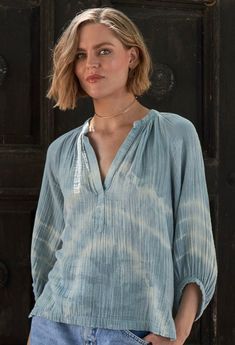 Eco friendly caftans and tunics inspired by the ocean, made on main street. Ethically sourced and locally made in Los Angeles. Inspired by our popular gauze dress, the perfect gauze shirt seemed like a no-brainer.  Made in our classic, super soft, easy-care cotton gauze, this flattering shirt looks great on everybody, every time.  With a perfect v-neck, gentle gathers and the ideal sleeve length, this one will be in heavy rotation.  We added side slits to the hem to ensure a comfortable fit over the hips.  Pairs perfectly with our gauze palazzo pant and just about everything else in your wardrobe. Sheerness: none Model height: 5'10" Fabric: 100% Cotton Machine wash, tumble, hang or lay flat to dry. Cotton Gauze Top, Caftan Tunic, Gauze Shirt, Gauze Top, Palazzo Pant, Tie Dye Cotton, Blue River, Gauze Dress, By The Ocean