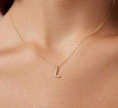 "14K SOLID WHITE GOLD DAINTY INITIAL NECKLACE WITH DIAMONDS Metal : 14K Solid Gold Necklace Length : 16 inches / 40cm Letter Height : 7mm Letter Width : 4.80mm Diamond : 9 Diamonds --- Nice White Color Sparkle Diamonds ---- G-H color SI2 clarity Total Carat: 0.08ct to 0.12cts (Depending on the letter) ---MADE IN USA--- ---All letters from A to Z are available. Please indicate your letter choice in the \"notes to seller\" section on the order. ---This is a beautiful 14K Solid White Gold Dainty In Elegant Everyday Letter Necklace, Elegant Diamond Cut Initial Pendant Necklace, L Necklace Initial, Diamond Letter Necklace, L Letter Necklace, L Initial Necklace, Diamond Initial Necklace For Gift, Fine Jewelry Style, Letter L Necklace, Yellow Gold Cross Necklace