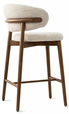 an upholstered bar stool with a wooden frame and seat cushion in white fabric