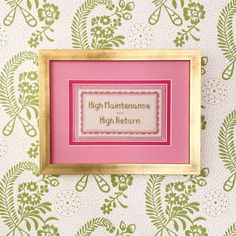 a pink and gold framed cross stitch pattern with the words high maintenance, high return