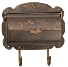 an ornately decorated metal box on wheels