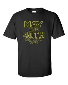 a black shirt with the words may the 4th be with you written in yellow on it