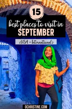 a woman standing in front of an archway with the words best places to visit in september