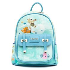 This LIMITED EDITION Finding Nemofashion mini backpack features the characters from Finding Nemo including Nemo and Squirt on the front with Pearl on the pocket, all in beautiful, bright colors. The side pouches show more of their friends. The back of the bag shows Bruce the shark sneaking up on an unassuming Nemo and Dory. The bag has fabric straps perfect for puttingpins on. Bruce The Shark, Disney Prints, Disney Lines, Accessoires Barbie, Disney Finding Nemo, Pop Disney, Mini Backpacks, Loungefly Bag, Disney Bag