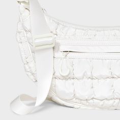 Solid-color crossbody bag from Wild Fable™ in half-moon shape. Lightweight design with interior and exterior pockets. Adjustable strap allows for easy carrying. Wild Fable™: A look for every story. If you're not satisfied with any Target Owned Brand item, return it within one year with a receipt for an exchange or a refund. White Nylon Shoulder Bag With Detachable Strap, Modern White Nylon Shoulder Bag, White Nylon Shoulder Bag With Removable Pouch, White Nylon Shoulder Bag With Zipper Closure, White Nylon Shoulder Bag For Everyday Use, White Nylon Shoulder Bag For On-the-go, White Nylon Crossbody Shoulder Bag, Modern White Shoulder Bag With Cell Phone Pocket, Functional White Shoulder Bag With Adjustable Strap