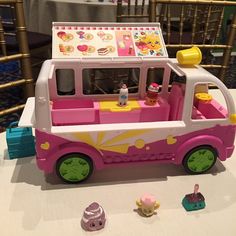 a toy food truck is set up on a table