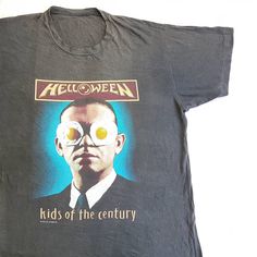 1991 Helloween Kids Of The Century T Shirt Size On Tag: (see measurement) Tag: (tag was cut) MEASUREMENT pit to pit: 23 inches top to bottom: 31 inches to see what do we mean by pit to pit and top to bottom, copy and paste this link in your browser http://imgur.com/h0e1woc CONDITION vintage 1991 promo shirt from Helloween, shirt comes with over all fading, good wear soft cotton feel, cracks and fading on front print, single stitch on both sleeves and hem, the tag was cut but fit like modern XL, Vintage Halloween Fan Merchandise T-shirt, Vintage Distressed Tops For Halloween, 90s Halloween T-shirt With Screen Print, Vintage Distressed Halloween T-shirt, Vintage Halloween Cotton T-shirt, Vintage Cotton Halloween T-shirt, Vintage Halloween Fan Merchandise Tops, Vintage Cotton Tops For Halloween, Helloween Band