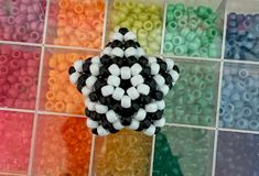 the tutorial i followed for this is saved in my kandi board Kandi Aesthetic, Kandi Tutorial, Kandi Star, 3d Kandi, Rave Kandi