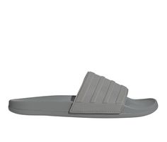 The Adilette Cloudfoam+ Mono Sport Slide Sandals feature a single-band synthetic upper with the iconic logo for a classic yet contemporary look. The minimalist design adds a touch of effortless cool to your outfit, whether you're lounging by the pool or exploring the city streets. Open toe, Classic round toe, Slip-on for easy entry, Lightly padded footbed, Breathable fabric lining, Flexible and lightweight construction | Men's Adidas Adilette Cloudfoam+ Mono Sport Slide Sandals in Grey Size 9 Modern Non-slip Synthetic Slides, Adidas Synthetic Slide Sandals, Gray Slip-on Sports Slides, Comfortable Adidas Slip-on Slides, Adidas Sports Slip-on Flip Flops, Adidas Non-slip Slides For Streetwear, Adidas Non-slip Slides, Adidas Adilette, Mens Sandals