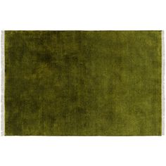 a green rug with fringes on it