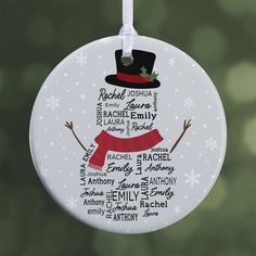 a christmas ornament with the names of people around the world