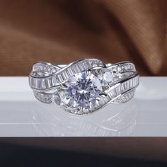 a white gold ring with two diamonds on it