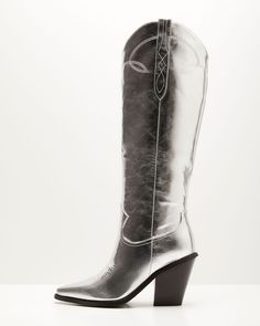 NOT ELIGIBLE FOR DISCOUNT. Heel Height: 3.5" Material: Upper – 100% PU, Lining – 100% Polyester Subtle, western-inspired stitching High stacked block heel Side pull tabs Closed pointed toe Long, knee-high boot Vici Collection, Boot Shop, Trending Now, Knee High Boots, Modern Woman, Knee High, Black Silver, Block Heels, Womens Boots