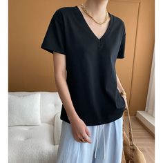 Loose V-neck Basic Tee Fabric: 96%Cotton+4%Spandex Size: Free Size Multiple Color Selections: Black, White  Season: Summer Stretch V-neck T-shirt For Work, Black V-neck T-shirt For Everyday, Basic Solid V-neck Top, Black V-neck T-shirt For Spring, Casual Cotton V-neck Top For Work, Everyday V-neck Top In Specific Color, Black V-neck Top For Spring, Black Stretch V-neck Top With Short Sleeves, V-neck T-shirt For Work