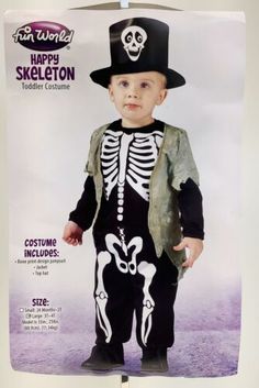 a little boy wearing a skeleton costume for halloween