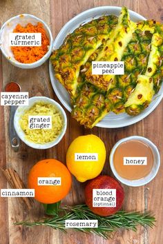 the ingredients for an orange pineapple pie on a wooden table