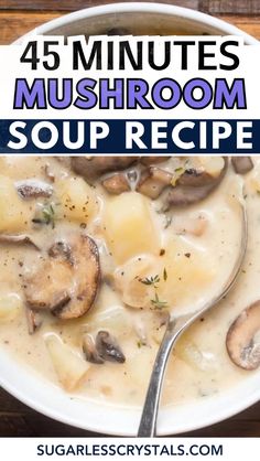 a white bowl filled with mushroom soup on top of a wooden table