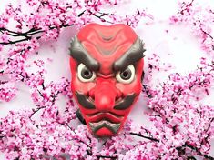 This is tengu mask painted like Urokodaki from demon slayer.  The mask is wearable and can fit adult heads with a inch width of the face.  Comes with satin tie to hold in place.  These are made to order so please allow some time.  Any questions feel free to ask ! Tengu Mask, Mask Painting, Costume Masks, Round Rock, Some Times, The Mask, Clear Coat, Paint Job, Costume Accessories