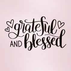 the words grateful and blessed written in black ink on a pink background