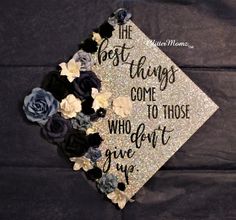 a graduation cap decorated with flowers and the words best things come to those who don't give up