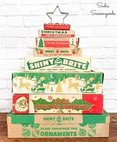 vintage christmas boxes stacked on top of each other