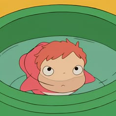 an animated image of a boy with red hair in a green tub looking at the camera