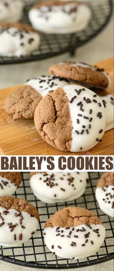 cookies with white icing and chocolate sprinkles are on a cooling rack