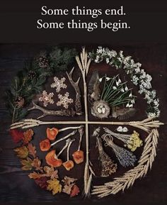 a cross made out of different types of flowers and leaves with the words some things end some things begin