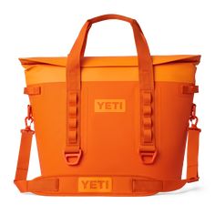 an orange yeti cooler bag on a white background