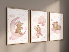 three framed teddy bears are hanging on the wall next to each other, one is holding a pink balloon