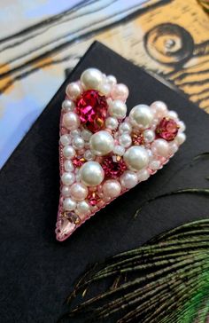 This beautiful heart brooch hand embroidered with beads, sequins, chrystal's and metal thread.Size 4 cm 5.5 cm. Beaded Heart Art, Beaded Hearts, Beaded Heart, Handmade Heart Brooches For Valentine's Day, Sacred Heart Bead Embroidery, Unique Heart-shaped Jewelry Brooch, Beaded Heart Brooch, Heart Pin, Vintage Jewelry Art