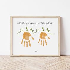 a framed print with two hands and the words, every pumpkins in the patch are safe