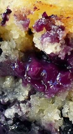 closeup of a piece of blueberry cobbler with crumbs on it