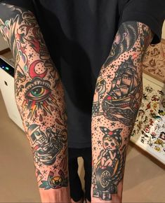 a person with tattoos on their arms and legs