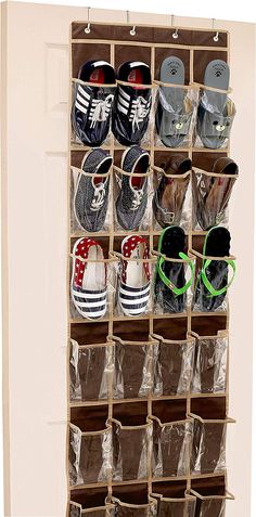 an over the door shoe rack with many pairs of shoes hanging on it's sides