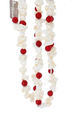 a red and white beaded necklace with beads